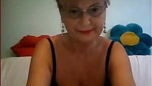 Big tits granny in glass masturbating on cam